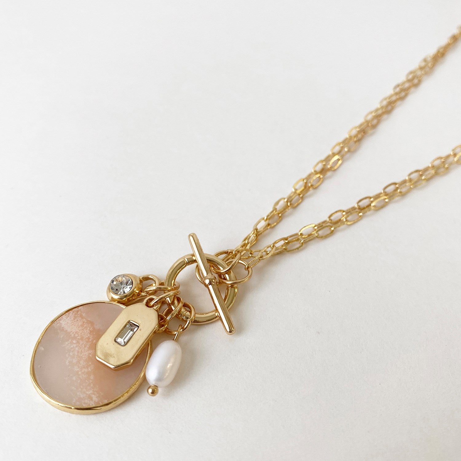 COLLIER "CHARMS & ROND ROSÉ" GOLD